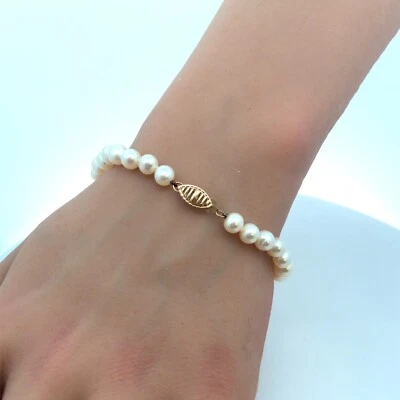 Brazalete de perlas redondas anudadas de oro amarillo de 14K de diseñador JWL Foto 1 de 4