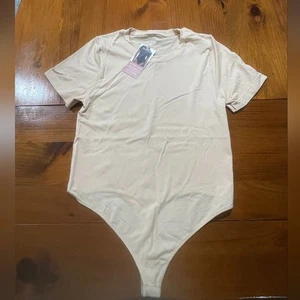 Nuevo con etiquetas Camiseta Tanga Para Mujer Casi Desnuda Todos los Días Body en Crema Suave Talla XL - Imagen 1 de 4