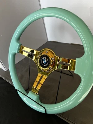 Volante BMW Aftermarket 14 radios azules dorados Tiffany nuevo en caja Foto 1 de 4