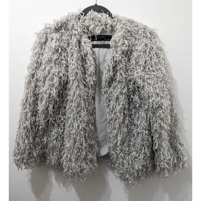 Chaqueta de piel sintética peluda con textura brillante para mujer talla S de ZARA Foto 1 de 4