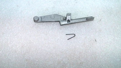 WALTHER PPK/S .22LR   EJECTOR & SPRING. - Image 1 of 4