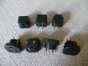 Job Lot of 7 UK to CN EU US Travel Adaptor Plug 2 Pin Adapters - LOOK! - Picture 1 of 4