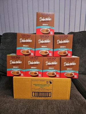 Estuche de 8 cajas Hartz deliciosas salsa lamibles golosinas húmedas para gatos atún y pescado blanco Foto 1 de 4