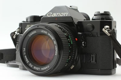 US Duty Paid [N come nuovo] Canon AE-1 Program Black SLR Cam NFD 50 mm f/1.4 dal GIAPPONE - Immagine 1 di 4