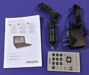 PHILIPS GENUINO - CONTROL REMOTO + MANUAL + CABLES DE ALIMENTACIÓN PARA REPRODUCTOR DE DVD PORTÁTIL PD-9000 - Imagen 1 de 4