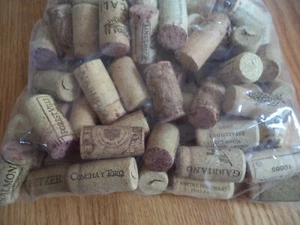 Lote de 100 corchos de vino naturales usados ​​reciclados artesanales reciclados - sin sintéticos - Imagen 1 de 4