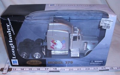 NEW RAY LONG HAULER PETERBILT MODEL 379 SEMI TRUCK MODEL TOY BOXED - Image 1 of 2