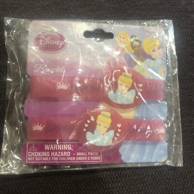 Pulseras de plástico rosa Cenicienta Dreamland favor de cumpleaños suministros de fiesta de 2 quilates Foto 1 de 4