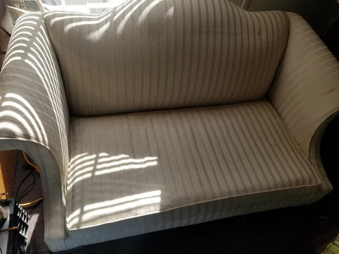 ETHAN ALLEN  Camelback Loveseat pre owned some small blemishes 57 " long ...NICE Cover