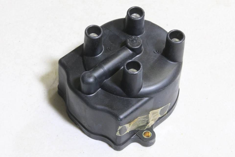 Tapa de distribuidor 12337478 Chev Spectrum 86-88 Geo 1989 Isuzu iMark 85-89 Sunburst Foto 1 de 1