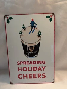 Guinness Beer Tin Metal Bar Sign Collectible New Skier Spreading Holiday Cheer - Picture 1 of 5