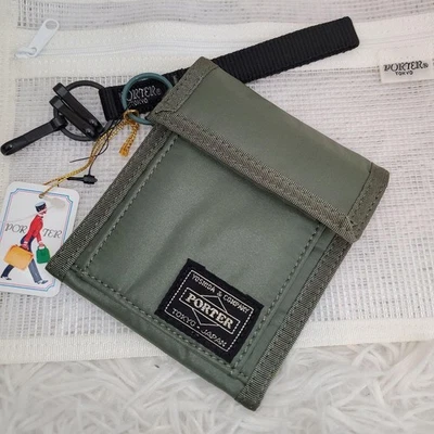 Cartera cápsula Porter caqui nailon triple pliegue delgada ligera usada Foto 1 de 4