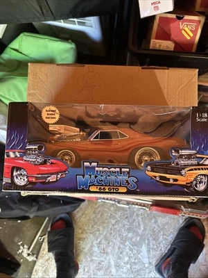 1966 Pontiac GTO 1:18 Scale Die Cast MUSCLE MACHINES Gold box Too Hot box - Image 1 of 3