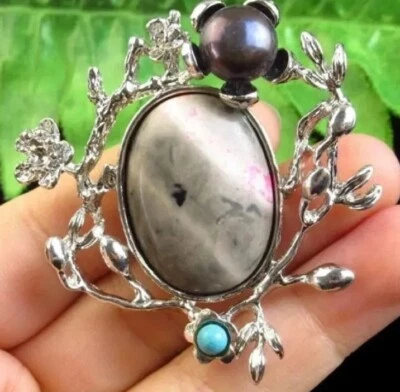 Broche colgante de perlas turquesa ágata de fuego envuelto en flores de plata tibetana  Foto 1 de 2