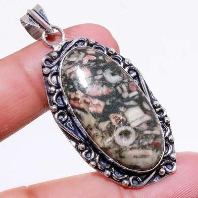 Ciondolo pietra preziosa ovale corallo fossile nero fatto a mano gioielli all... - Immagine 1 di 4