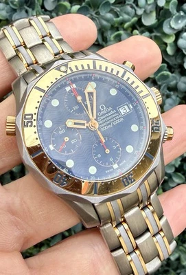 Reloj Omega Seamaster 300 oro 18K y titanio cronógrafo esfera azul 2296,80 solamente Foto 1 de 4