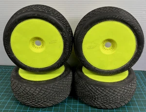 JConcepts 1/8 Buggy Tires on Yellow Dish Wheels 17mm Hex Set of 4 Blue Compound - Picture 1 of 14