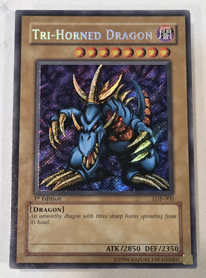 Yugioh LOB-000 Tri-Horned Dragon 1st Edition English Glossy Print Gradeable Mint - Image 1 of 4