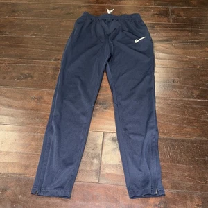 Nike Jugend Jungen marineblau sportliche Trainingshose Größe Large gebraucht, in einwandfreiem Zustand Reißverschluss an den Knöcheln - Bild 1 von 3