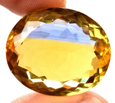 58.45 Cts.  Ametrine Blue & Yellow Oval Shape Certified Gemstone - Image 1 of 4