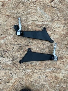 APRILIA TUONO 1000 2005 03 - 05. L/H & R/H PASSENGER FOOTREST HANGERS A2 - Picture 1 of 2