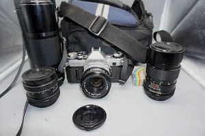 Canon AE-1 35mm Spiegelreflexkamera mit 50mm, 28mm, 135mm, 100-200mm Objektiv, Tasche, getestet - Bild 1 von 7
