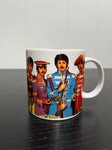 Taza de café The BEATLES Sgt Peppers Lonely Hearts Club 12 oz 2013 - Imagen 1 de 4