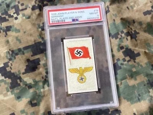 Nationalflaggen & Waffen DEUTSCHLAND Tabakkarte John Spieler 19/50 PSA 8 NM MT 1936 - Bild 1 von 3