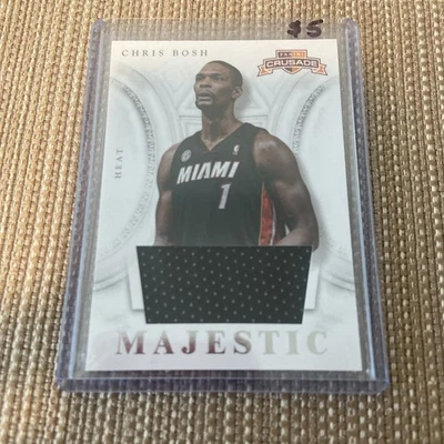Camiseta deportiva Panini Crusade Chris Bosh 2012-13 materiales majestuosos reliquia Miami Heat #68 Foto 1 de 4
