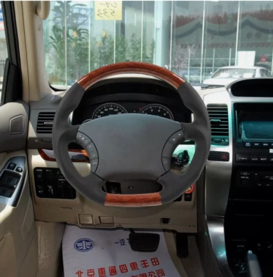 Volante de cuero con patrón de madera de melocotón para Toyota 4Runner 2003-2009 Foto 1 de 4