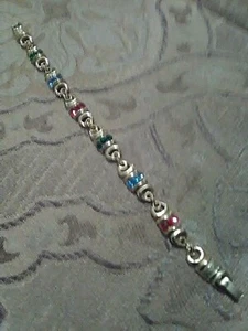 VINTAGE FASHION GOLDEN BRACELET CURVY GOLDEN MULTICOLOR FAUX GEM ACCENTS - Picture 1 of 3