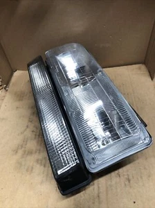 Used TYC Headlight w/ Bracket missing 2 bulbs Part #20-1977. - Picture 1 of 8