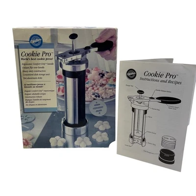 Prensa para galletas Wilton Cookie Pro Ergon.Comfort Grip 10 discos instrucciones recetas Foto 1 de 4