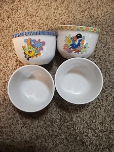 4 Stück 2002 Kellogg's Müslischale Tukan Sam Corny Rosine Bran Tony Tiger - Bild 1 von 4