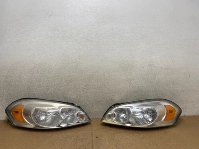 Juego faros halógenos Chevrolet Impala 2006-2013 izquierda+derecha V3661 DW Foto 1 de 4