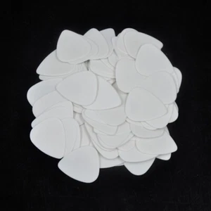 100 púas de guitarra Delrin medianas blancas de 0,6 mm 351 - Imagen 1 de 5