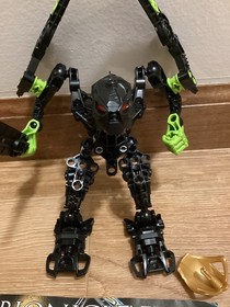 100% Complete and Retired Lego Bionicle Stars Skrall 7136 with manual /Gold mask