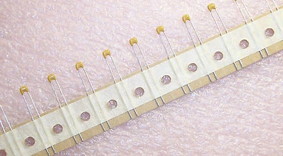 CANTIDAD (100) 15pf 50V 5% COG .1 ls CERÁMICA RADIAL MLCC CONDENSADORES K150J15COGF5TL2 Foto 1 de 2