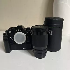 Fotocamera Nikon FG con motore MD-14 e 35-200 mm Soligor 3.8-5.3 - Foto 1 di 13