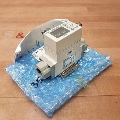 SMC PF2A711-F03-68N-X5 Flow Switch, 10-100L/min, 12-24VDC, 0.75MPa Max - NEW - Image 1 of 4