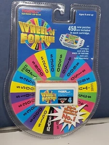 Tiger 1999 Glücksrad Deluxe Spiel elektronischer Handheld (#4 nur Cartridge) - Bild 1 von 6