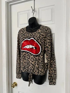 SUÉTER ELÁSTICO FREE KISSES ESTAMPADO ANIMAL Y LABIOS MANGA LARGA TALLA M - Imagen 1 de 8