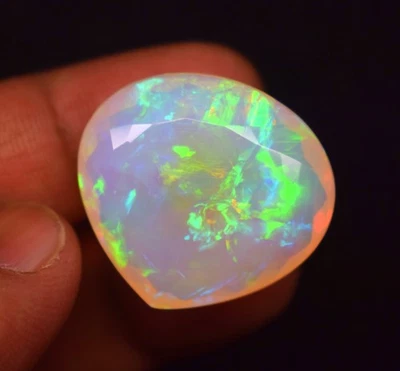 38 CT Multi Fire Natural Ethiopian Opal Pear Faceted Gemstone 28X26X12.3 mm - Image 1 of 4