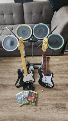 HUGE Xbox 360 Guitar Hero Rock Band  Drums &  (2) Guitars (3) Games Bundle - Image 1 of 4