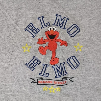 Camisa Elmo Vintage Años 90 Sesame Street Center Logo Bordado Adulto Talla XL Gris Foto 1 de 4