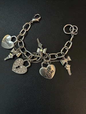 Женский серебряный браслет с брелоками GUESS - Изображение 1 из 3