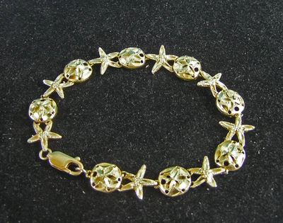 ❤️ Brazalete con dije de dólar de arena estrella de mar corte diamante de 7,5" de oro amarillo de 14K 9,4 g Foto 1 de 4