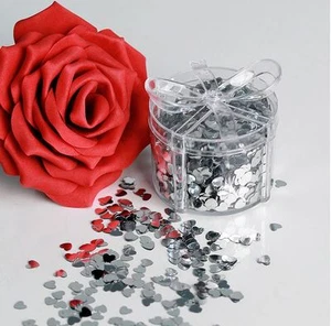 28932 Decoración dispersa Corazones de plástico plata 60 g en caja transparente con lazo - Imagen 1 de 1