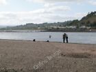 Photo 6X4 On The Salty: 22  Teignmouth Anglers In Waders Confer As The Ti C2011