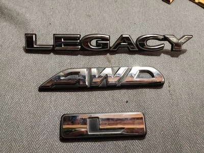 2001 - 2004 SUBARU LEGACY L AWD CHROME REAR TRUNK EMBLEM BADGE LOGO NAMEPLATE - Image 1 of 2
